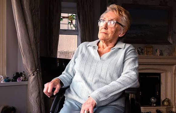 older lady in house