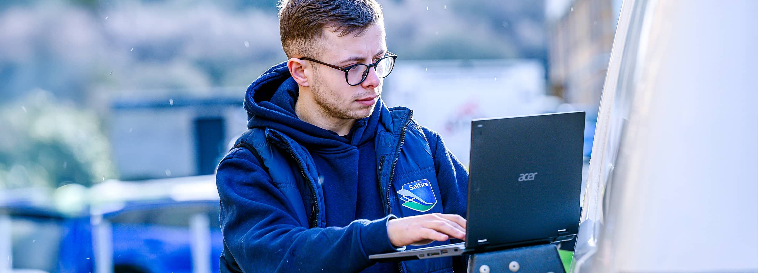 apprentice working on computer