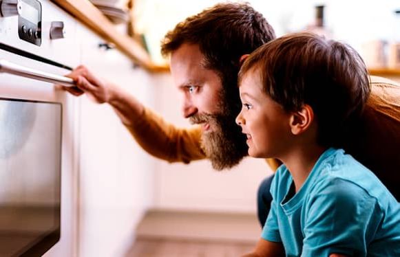 family keeping warm under blankets