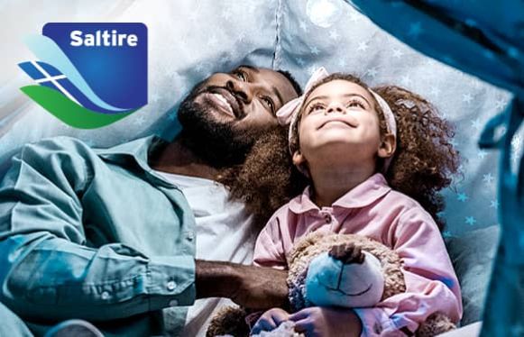 family keeping warm under blankets