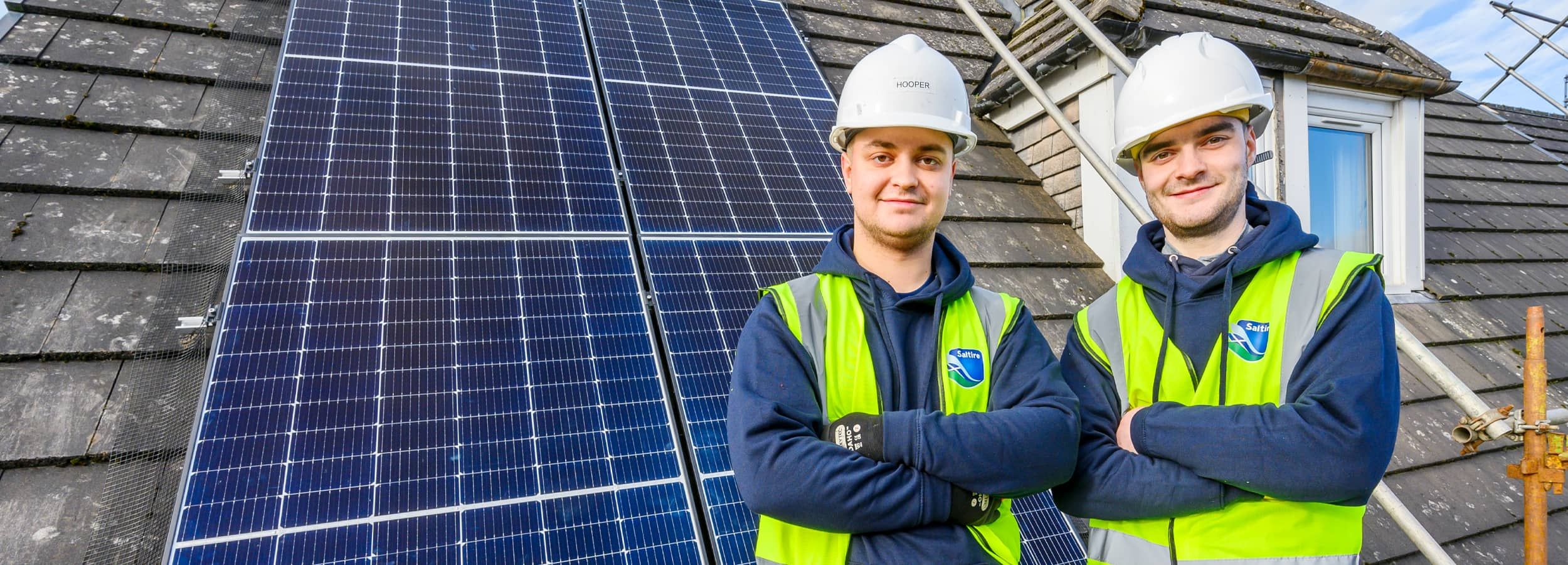 saltire workers and solar panels on house