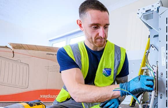 saltire worker servicing the boiler